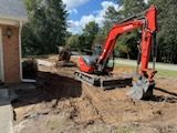 Our Land Grading service ensures your property's foundation is level, preventing water pooling and structural issues. Trust us to create a smooth and stable surface for your outdoor projects. for Southern Land Improvements in Edgefield, SC