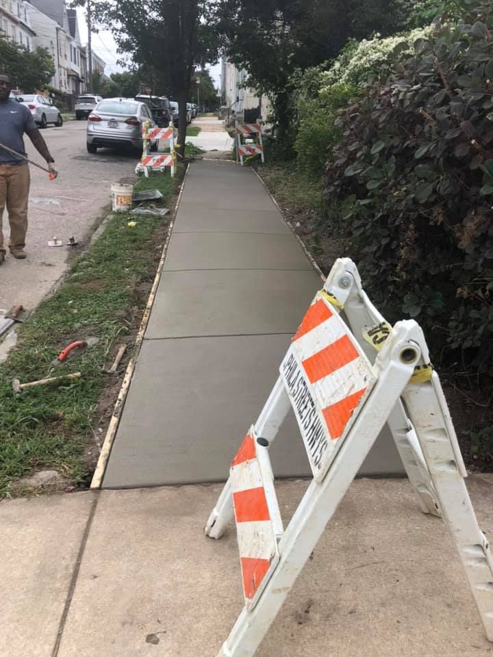Our Sidewalk Installation service offers homeowners durable and aesthetically pleasing walkways, crafted from high-quality concrete, ensuring safety and enhancing curb appeal with professional installation by our experienced team. for Concrete Plus LLC in Philadelphia, PA