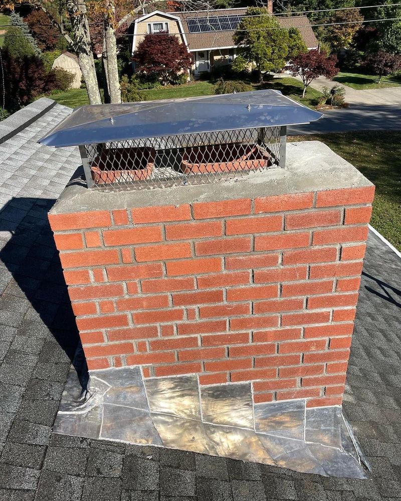 Chimney photos from restoration to new builds for All For U Roofing & Masonry in Boston, MA