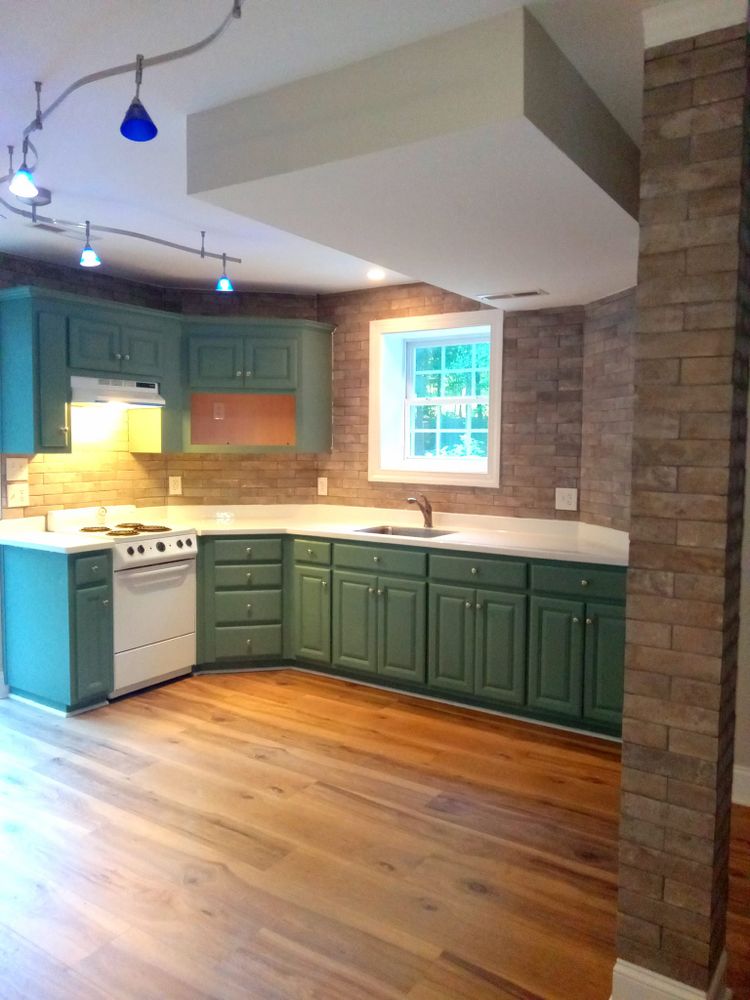 Transform your kitchen into a modern, functional space with our expert renovation services. We offer personalized designs, high-quality materials, and skilled craftsmanship to enhance both style and efficiency in your home. for Iron Man Construction in Charlotte, NC