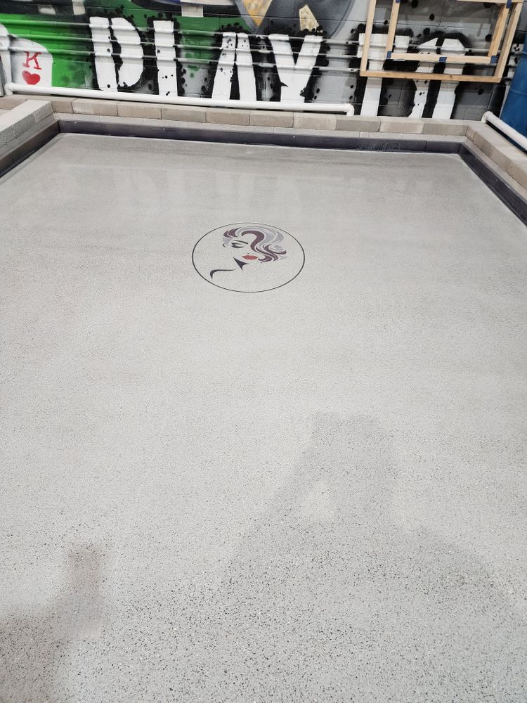 Our Epoxy Floor Coating service transforms dull concrete into a durable, attractive, easy-to-clean surface that resists stains, impacts, and wear—perfect for garages, basements, patios، and busy household spaces. for Douthat Solutions in Clearwater, FL