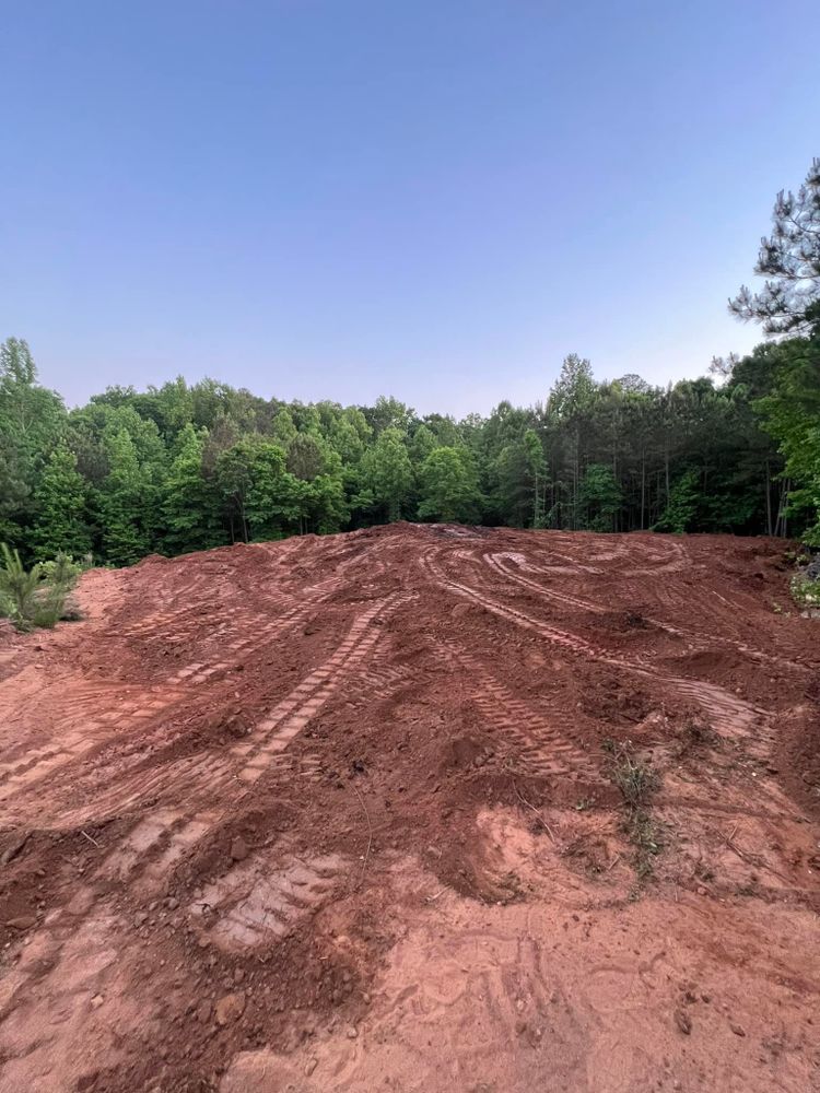 Our Land Clearing & Demolition service provides efficient clearing of unwanted vegetation and safe dismantling of structures, ensuring your property is prepared and pristine for new development or landscaping projects. for ADP Enterprises LLC in Griffin, GA