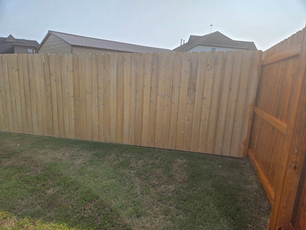 Fence staining for Patriot Fence  in Oakland, TN