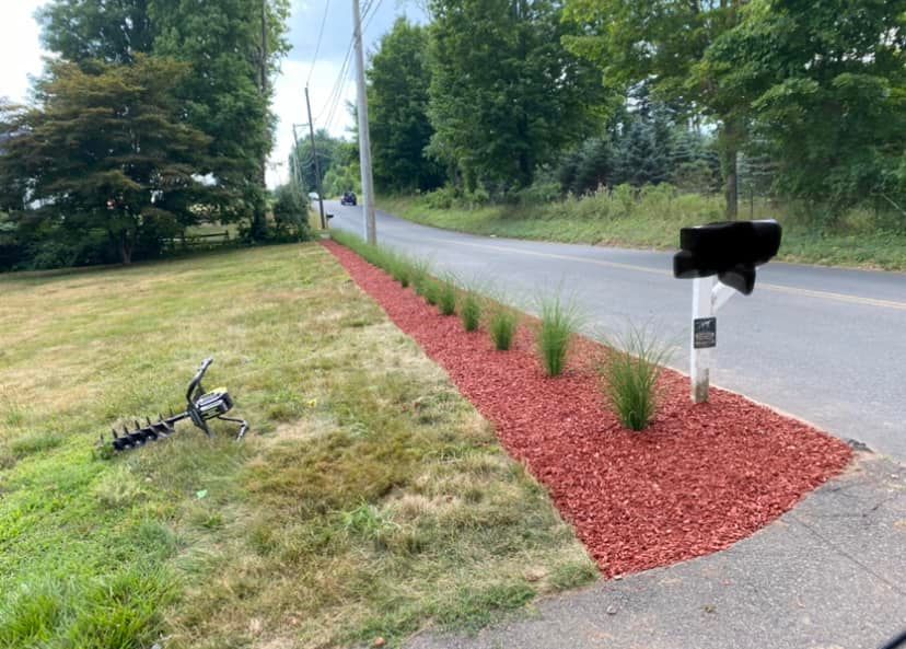 Our Brush & Debris Removal service ensures your property remains pristine year-round, efficiently clearing excess foliage and clutter. Complementing our snow removal services, we guarantee a safe, clean outdoor space in every season. for Dibs Landscaping LLC in Cheshire, CT