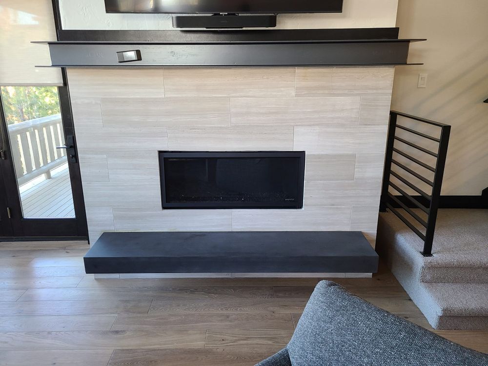Enhance your home with our expert Fireplace Installation service, combining functionality and style. Our skilled team ensures a seamless fit and elegant finish to complement any room's decor perfectly. for Cox Tile and Stone in Clinton, UT