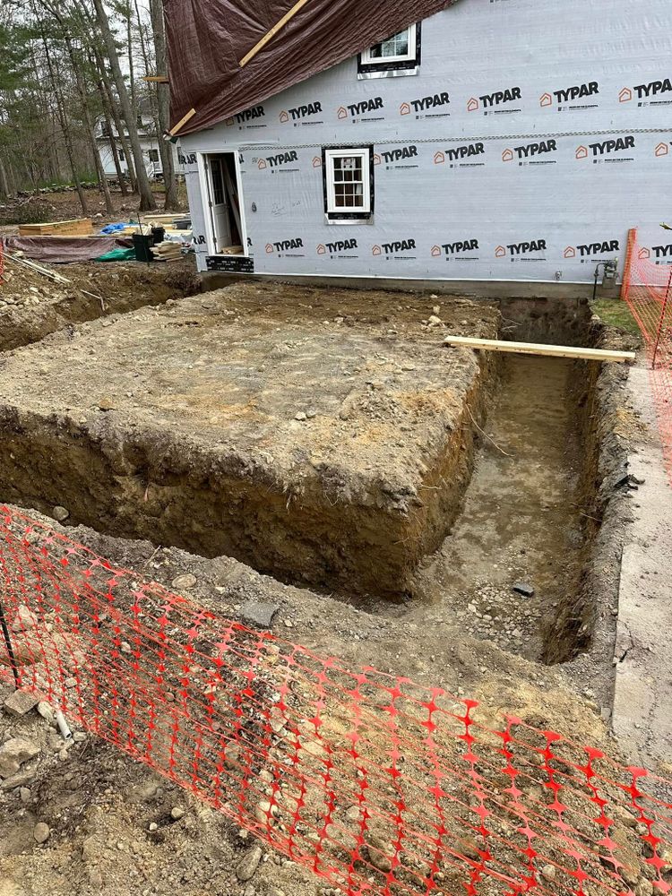 Our Foundation Digging service ensures precise, reliable excavations for new projects, providing sturdy bases with expert site assessment and state-of-the-art equipment to support your home's structural integrity from the ground up. for E. Gordon Construction in Dighton, MA