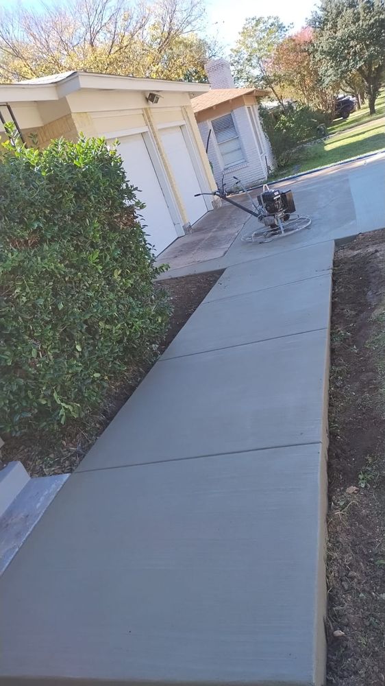 Transform your outdoor space with our Sidewalk Installation service. Our expert team will install durable and visually appealing sidewalks, enhancing the beauty and functionality of your home's exterior. for D & A Concrete Designs in Fort Worth,, TX