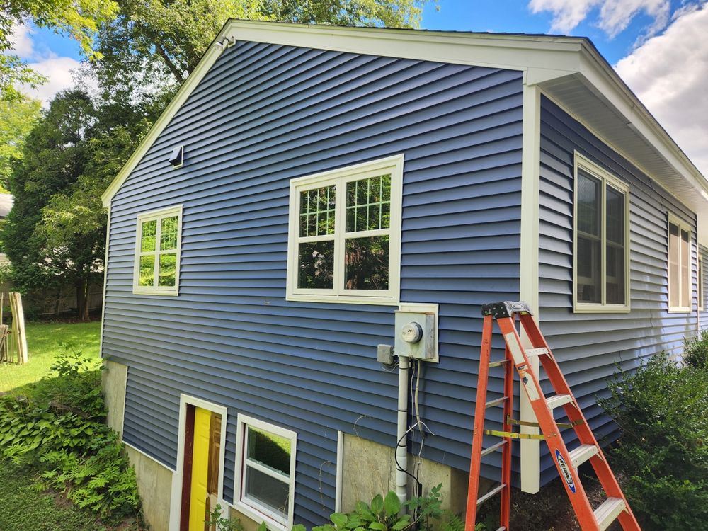 Transform your home with our expert siding service. Our team specializes in vinyl siding house installations, offering durability and aesthetic appeal to enhance your home's value and curb appeal. for Vandal and Sons Home Improvement in Springfield, VT