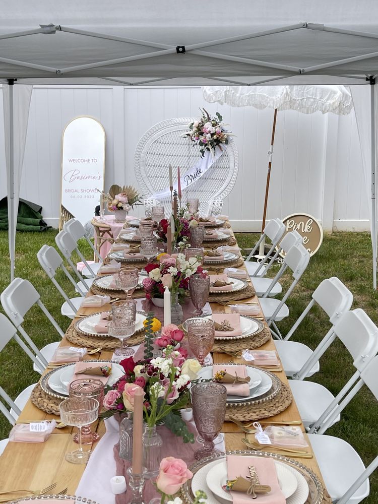 Our tablescape service can take your event to the next level by creating a stunning and cohesive design that will leave your guests in awe. With careful attention to detail, we ensured the aesthetics of your table settings are in good hands, from flowers to custom touches that create a visually appealing display. for Pink Tree Picnic in Hartford, CT