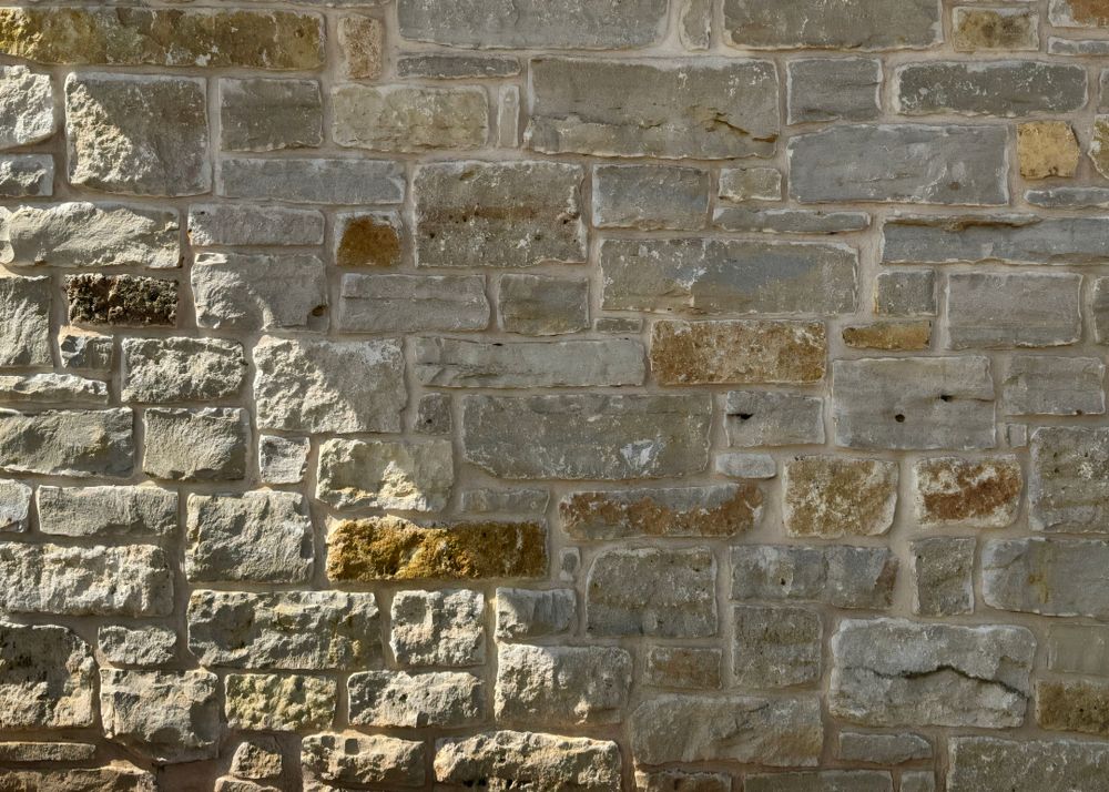 Our Granbury White Chopped Stone is a natural split cut in 4-10" cuts at full depth 3-5" An elegant stone that ties in perfect with any outdoor spaces or patios. for Granbury Stone Industries in Granbury, TX
