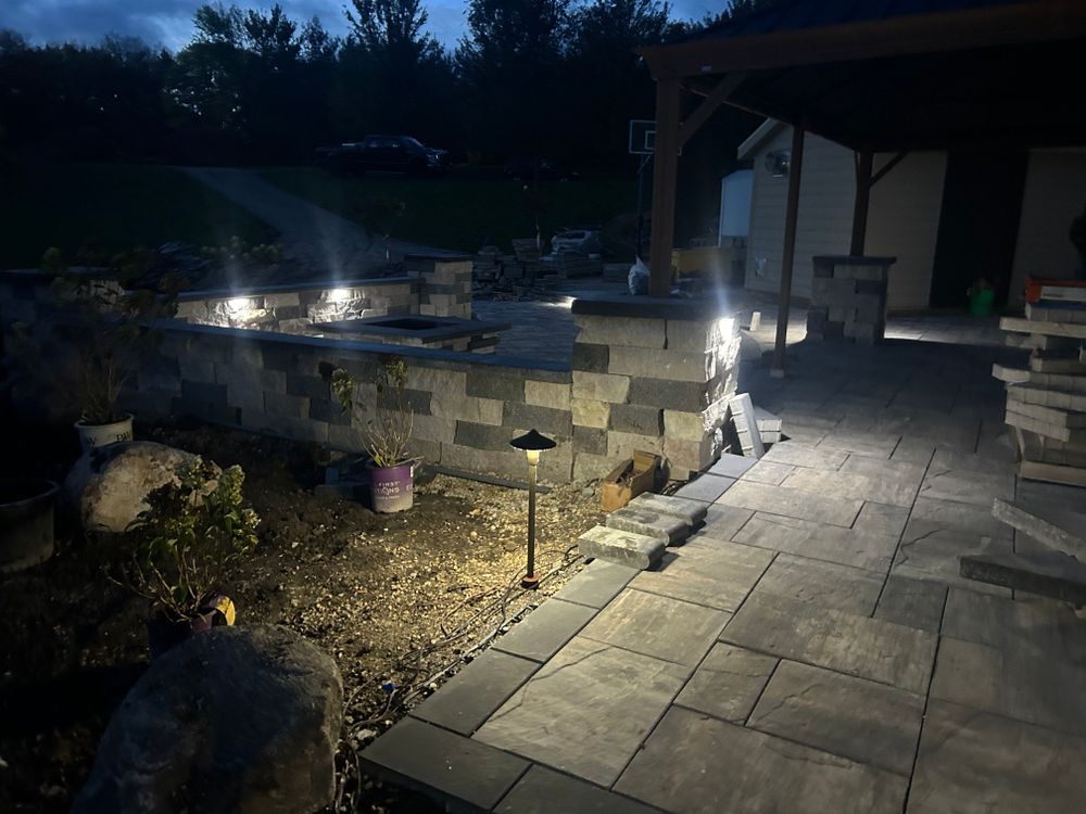 Our Outdoor Kitchen service offers homeowners the opportunity to enhance their outdoor living space with a custom-built and durable kitchen area for cooking, dining, and entertaining. for Boss Construction in Saint Paul, MN