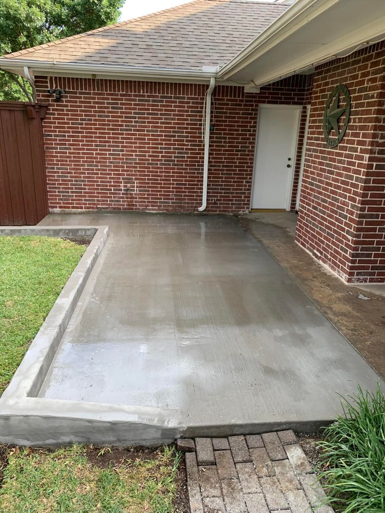 Transform your outdoor space with our Patio Design & Installation service. We specialize in crafting durable, stylish concrete patios tailored to your lifestyle, enhancing both aesthetics and functionality for ultimate backyard enjoyment. for Midcities Concrete in Arlington, TX