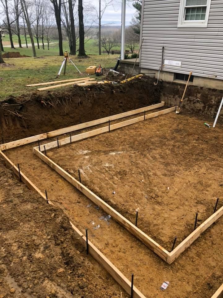 Our Foundation Digging service ensures precise excavation for residential projects, providing a solid base to guarantee the stability and longevity of your home while adhering to the highest safety and quality standards. for ASC Excavating LLC in Lucas, OH