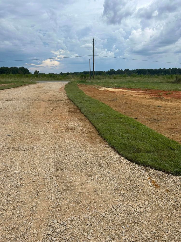 Our expert team offers professional retaining wall construction service to protect your property from erosion and create visually appealing landscape features that enhance the beauty and functionality of your outdoor space. for Jt's Landscaping in Webb, AL