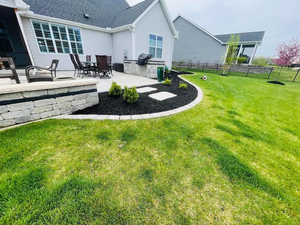 Our fertilization services provide your lawn with essential nutrients to promote healthy growth and lush greenery. Trust us to help maintain a vibrant and beautiful landscape for your home all year round. for Manny's Cleaning,Lawn Care & Snow Removal Services in Champaign, IL