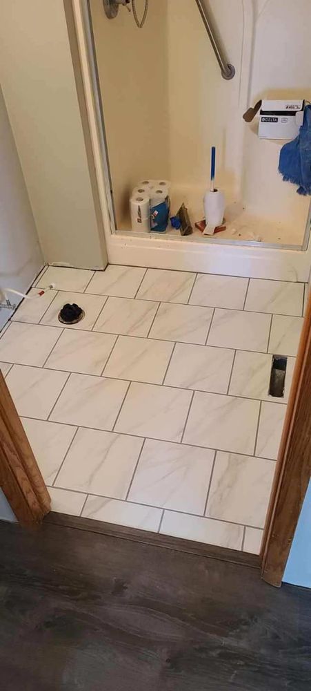 Enhance your home with our expert tiling service, transforming your space with beautiful and durable tile options. Our skilled team ensures precision installation for a stunning and long-lasting finish. for View Point Construction in Huntingburg, IN