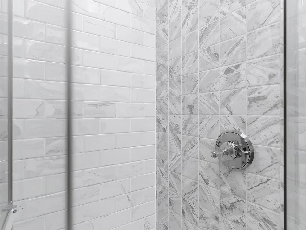 Transform your space with our professional tiling service. Our expert team ensures precise installation, enhancing the beauty and durability of your floors and walls with high-quality tiles that match your style. for Tucker Home Solutions in Sterling Heights, MI