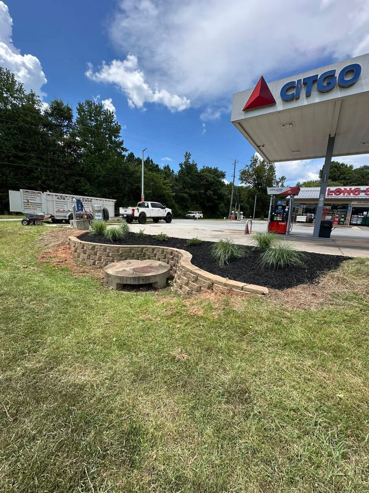Enhance your garden's beauty and health with our professional mulch installation service, providing effective moisture retention, weed suppression, and soil enrichment to ensure a vibrant landscape all year round. for Jameson’s Landscaping & Pressure Washing in Eatonton, GA