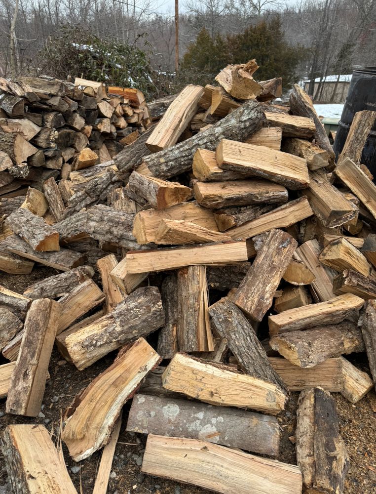 We offer high-quality seasoned firewood near you, perfect for cozying up by the fireplace or outdoor fire pit. Enjoy clean-burning wood with our convenient delivery service right to your door. for Branch Out Tree Care LLC in Fredericksburg, VA