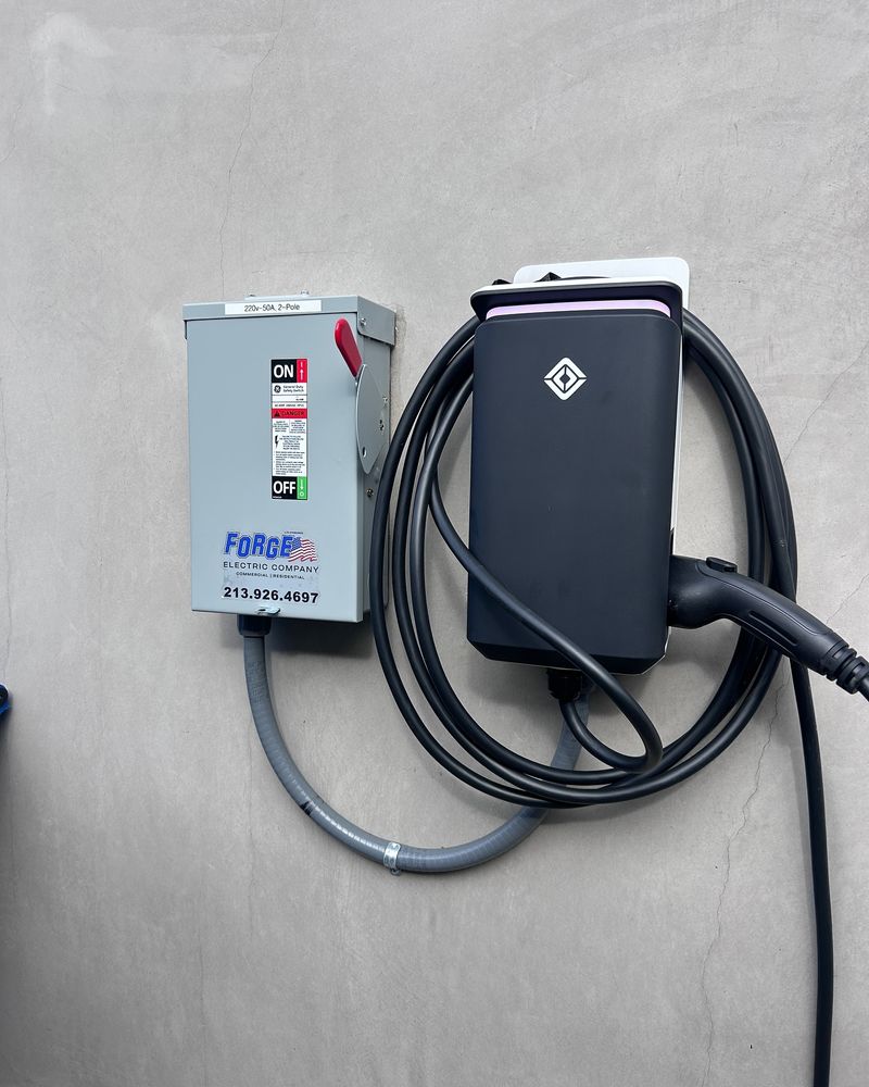 Our Electric Vehicle Charging service provides convenient and efficient charging solutions for homeowners looking to power up their electric vehicles at home, ensuring you are always ready to hit the road ! for Forge Electric Company in Los Angeles, CA