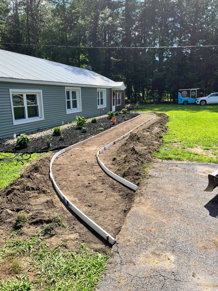 Our Sidewalk Installation service offers durable, expertly crafted walkways that enhance your property's curb appeal and safety. Trust our skilled team for efficient, reliable construction with high-quality materials tailored to your needs. for LeClaire Flatworx in Bomoseen, VT