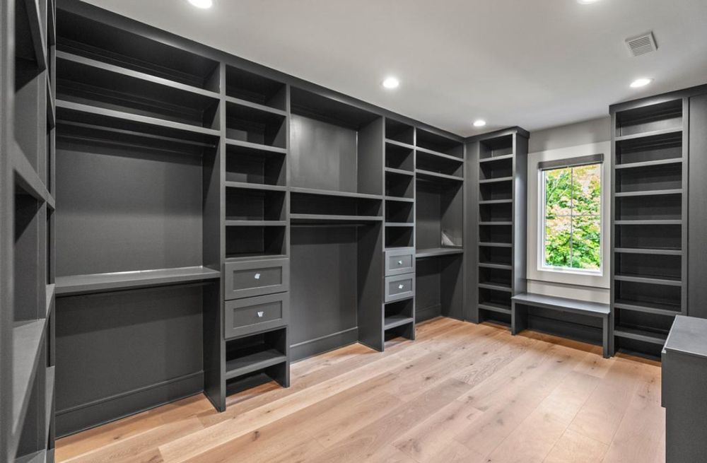 Enhance your home's organization and style with our custom wood closet systems, expertly designed and installed to maximize space, functionality, and aesthetic appeal in any room of your house. for Quality Trim NC in Raleigh, NC