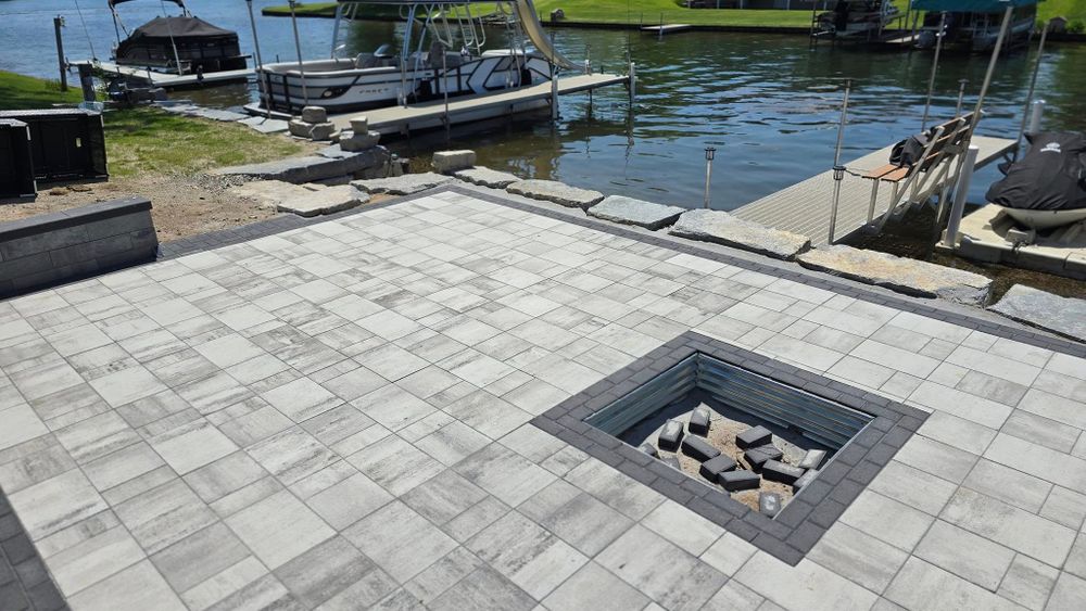 Transform your outdoor space with our Patio Design & Construction service, offering expert craftsmanship and personalized designs to create beautiful, durable patios tailored to enhance your home’s aesthetic and functionality. for Best One Hardscapes in Brooklyn, MI