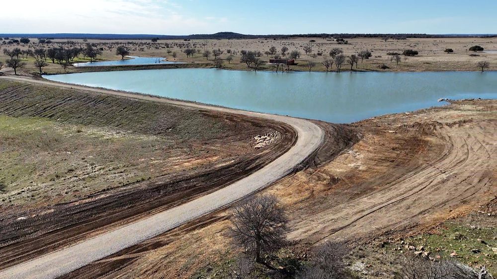 Our Pond Work service offers precise excavation and expert design for your ideal water feature, enhancing both aesthetics and property value while ensuring proper drainage and environmental sustainability. for South Prairie Construction in South Bend, TX