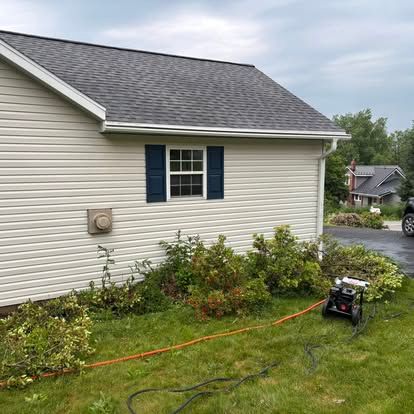 Enhance your home's curb appeal with our Pressure Washing and Soft Washing services, effectively removing dirt, mold, and stains from exterior surfaces while maintaining the integrity of delicate materials. for Bryant Property Solutions in Altoona, PA
