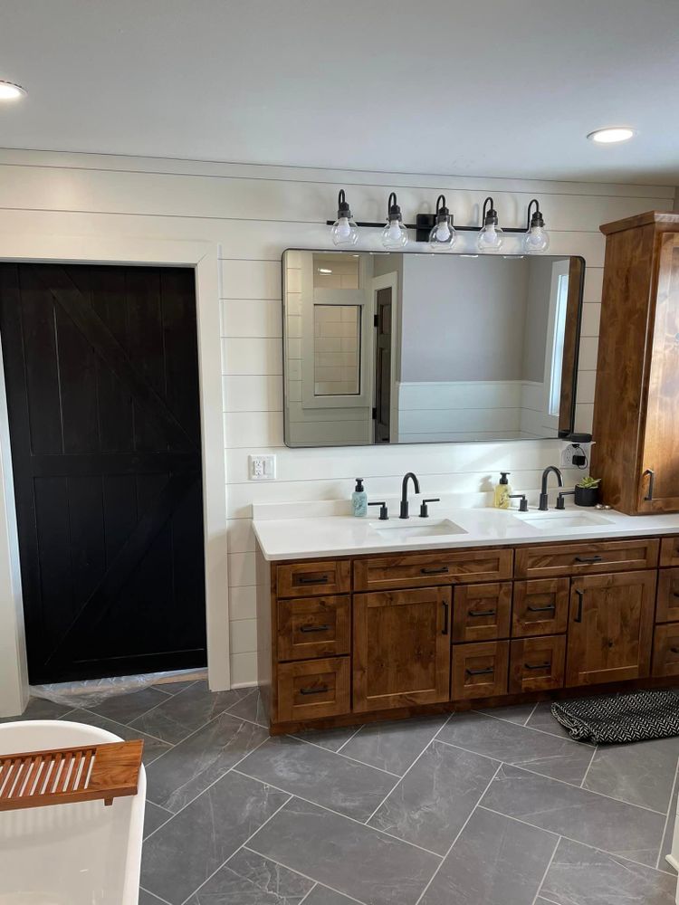 Transform your outdated bathroom into a luxurious retreat with our expert renovation service. From custom tile work to modern fixtures, we will create the perfect space for relaxation and rejuvenation. for Fox Construction in Rudd, IA