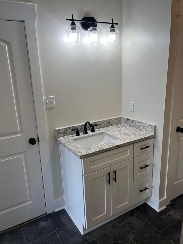 Transform your kitchen with our Cabinet Refinishing service, offering a cost-effective way to refresh and revitalize your cabinets for a modern look without the need for complete replacement. for Arthur Tile & Remodeling in Munford, TN