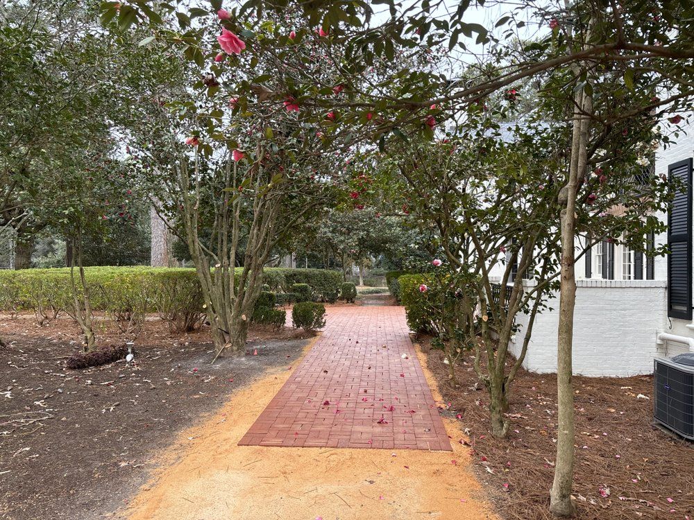 Our Hardscaping and Landscaping Design service offers homeowners a comprehensive solution to enhance the beauty and functionality of their outdoor space, combining expertly-crafted structures with aesthetically pleasing landscaping elements. for Pink Pelican Tree Service & Landscaping in Columbia, SC