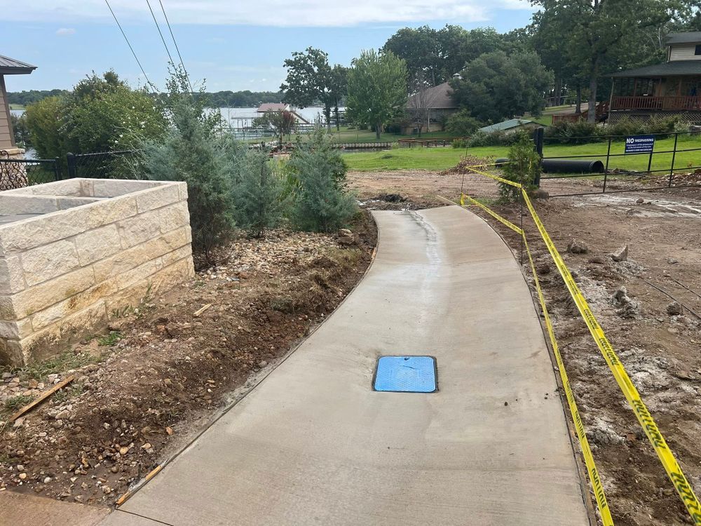 Our Concrete Work service offers homeowners high-quality, durable installations and repairs for driveways, patios, and walkways. We ensure precision craftsmanship to enhance the beauty and functionality of your outdoor spaces. for Javonnies Concrete Services LLC in Gun Barrel City, TX