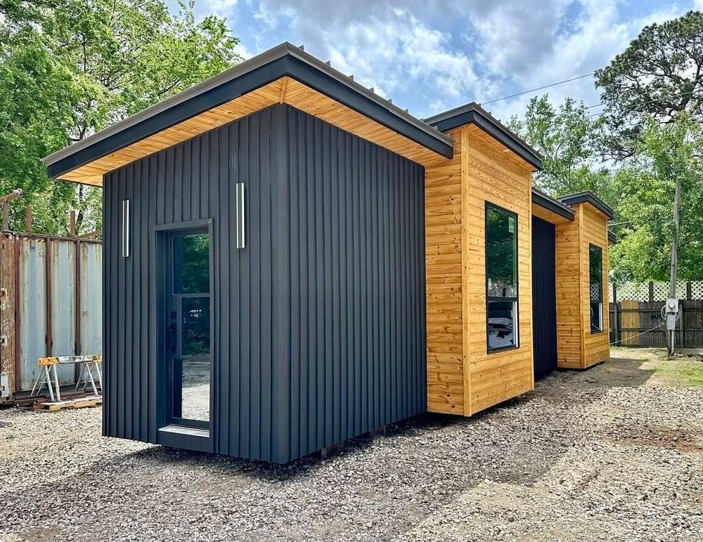 Explore our Tiny Homes service, offering sustainable and stylish small living solutions. Perfect for modern homeowners seeking functionality and affordability without sacrificing comfort or quality in a compact space. Modern Contemporary Tiny House Prefab 40x8ft 320sqft 1 Bed 1 Bath Wood/Metal Starting at $79,999.00 for Rio Grande Construction in Houston, TX
