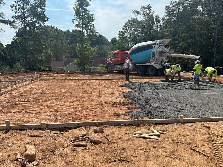 Discover what is concrete with our expert Concrete Work service, providing homeowners with durable driveways, patios, and foundations. Our skilled team ensures quality craftsmanship tailored to enhance your home's beauty and strength. for Creative Remodeling & Plus in Lilburn, GA