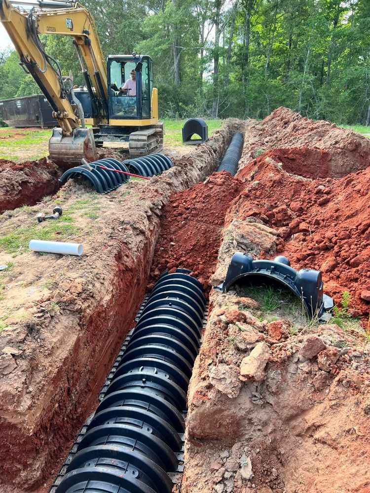 Our Sewer & Water Lines service ensures reliable, efficient installation and repair, safeguarding your home's foundation with expert excavation techniques to maintain seamless water flow and prevent costly damage. for DC Construction Company LLC in Clanton, AL