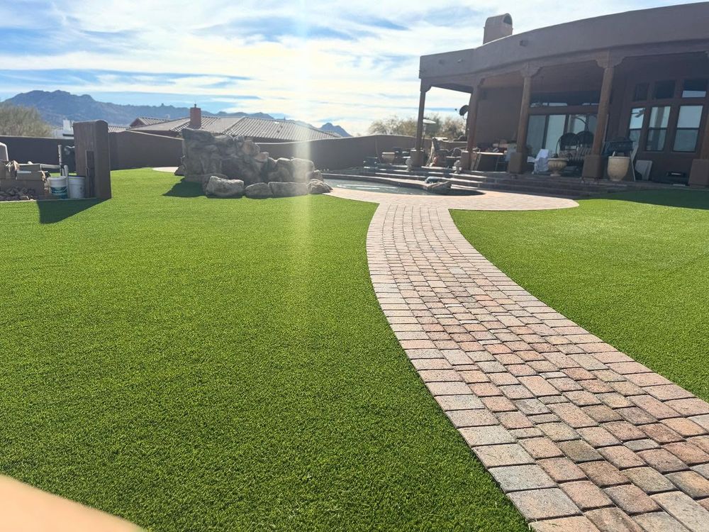 Transform your yard with our expert residential artificial turf grass installation, providing a low-maintenance, eco-friendly solution for a lush and durable lawn that's perfect for every season. for Kanelo's Hardscape and Landscape Services in Buckeye, AZ