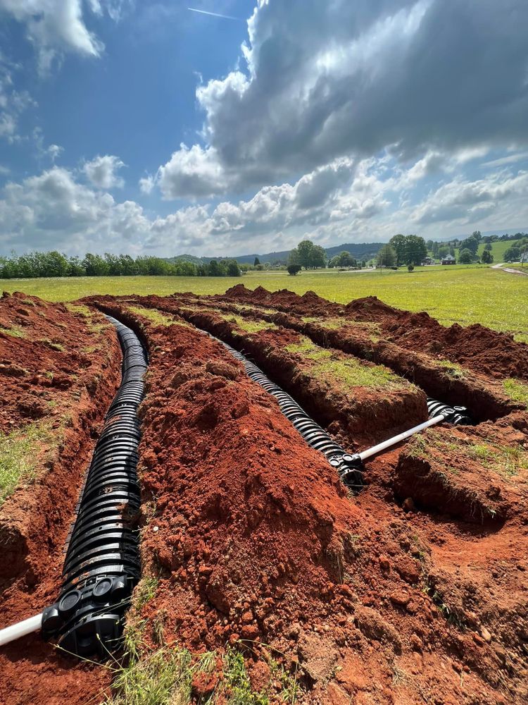 Our trenching service safely and efficiently creates precise channels for utilities, drainage, or landscaping projects, ensuring minimal disruption to your property while providing reliable groundwork solutions tailored to your needs. for Southeast Land Services in Cleveland, TN