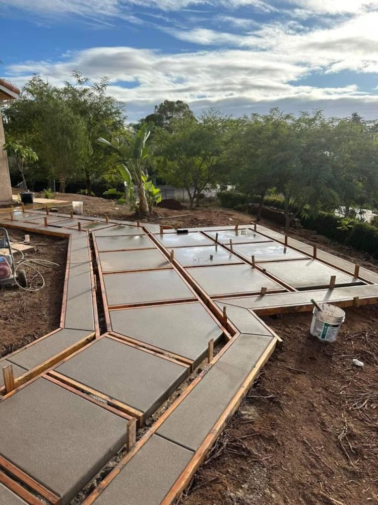 Enhance your home's curb appeal with our durable and stylish concrete services. Our expert team designs and installs high-quality concrete walkways that add value, functionality, and beauty to any outdoor space. for Vanguard Concrete Creations in Winston-Salem, NC