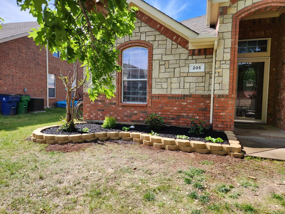 Enhance your garden's health and beauty with our professional mulch installation service, providing optimal moisture retention, weed suppression, and a polished appearance for your landscape. Transform outdoor spaces effortlessly with our expert touch. for Paquito's Landscaping in Ellis County, TX