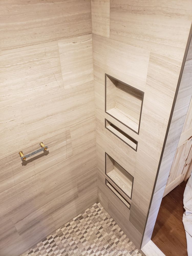 Transform your home with our expert tile service, offering precision installation and a wide range of styles to enhance any space. experience durability, elegance, and craftsmanship tailored to your vision. for Demary Construction in Plattsburgh, NY