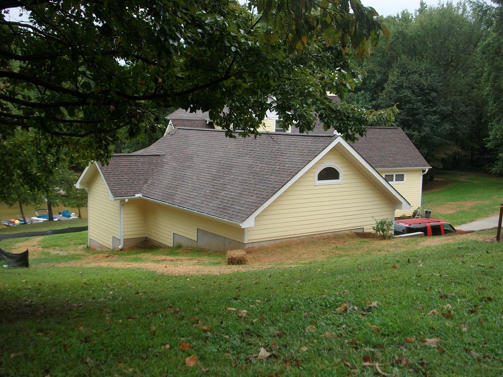 • Residential Renovation
• Residential design-build
• Location Troutman, NC

Main issue was that the garage could not be built at 90 degrees to the house due to the setbacks of the lot. Several contractors stated that the project could not be built. Innovative design including staggering garage doors to provide access to the front steps and splitting the ridge to allow the front and rear roof slopes to plane out with the adjacent slopes. for Merl's Construction LLC in Statesville, NC