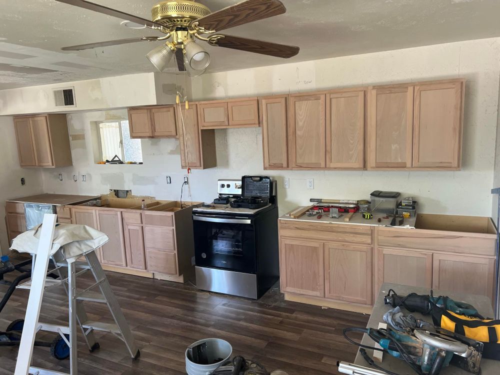Revitalize your space with our Kitchen and Cabinet Refinishing service, offering expert craftsmanship to renew surfaces, enhance aesthetics, and extend the life of your cabinets without the cost of replacements. for Mike's Custom Painting in Kissee Mills, MO