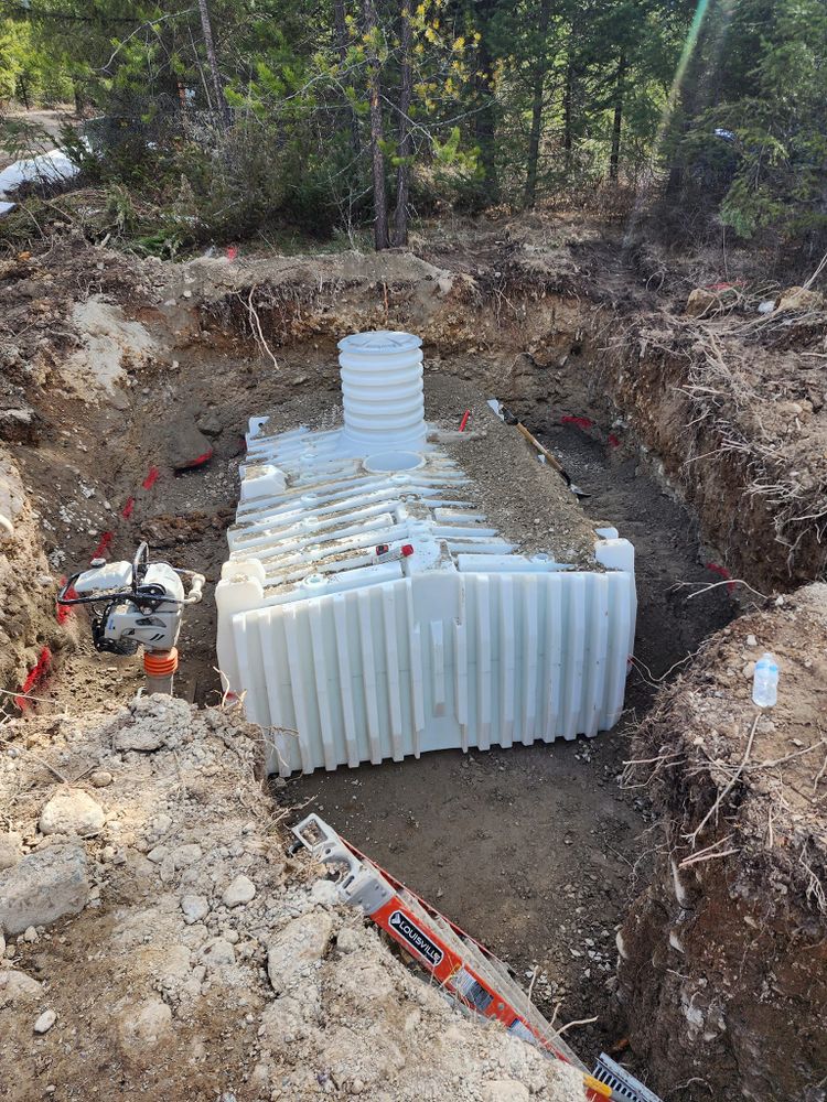 Our septic system installation service provides expert excavation, precise tank placement, and dependable drainage solutions, ensuring your home receives a safe, efficient, code-compliant wastewater system built to last. for Bull Mountain Stoneworks & Excavation in Kalispell, MT