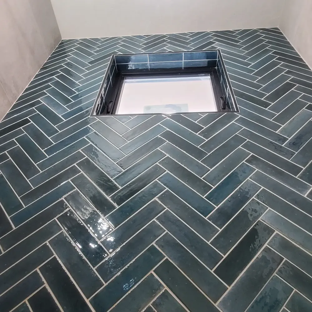 Herringbone shower for Elite Tile in La Grande, OR