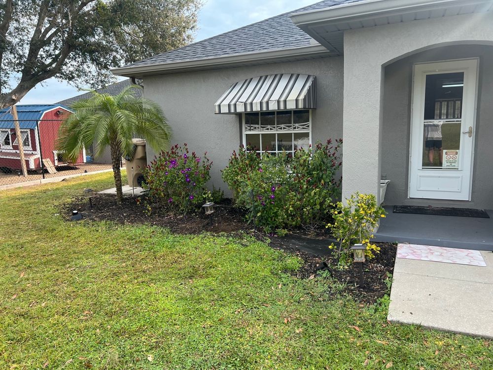 Landscape with retaining wall for Thurmond & Sons Landscaping  in Montverde, FL