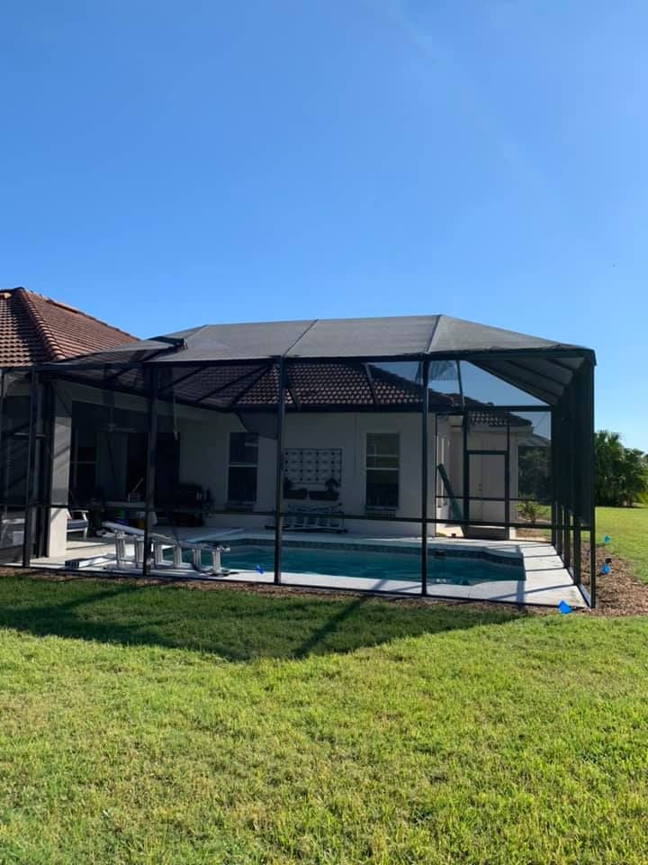 Our Full Cage Rescreen service rejuvenates your outdoor space, providing durable and weather-resistant screens to enhance comfort and safety, ensuring a pristine view while keeping pests out of your patio or pool area. for Premier Rescreen in Port Charlotte, FL
