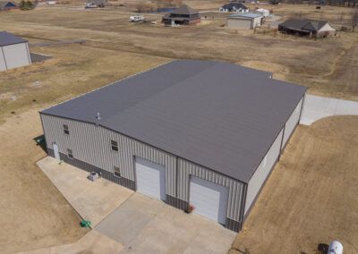 Our steel warehouses provide homeowners with secure and durable storage solutions for their new construction projects, ensuring their materials and equipment are protected from the elements and theft during development. for K&L Construction in Milledgeville, GA