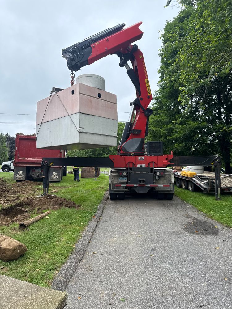 Our Septic Tank Replacement service provides homeowners with comprehensive solutions, ensuring efficient installation of high-quality systems while minimizing disruption to your property and adhering to local regulations for optimal functionality and longevity. for DArcy  Cleveland & Sons Excavation LLC in Pawcatuck, CT