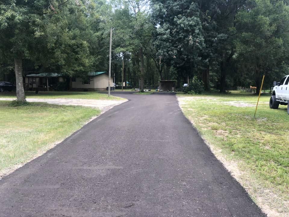 Our Asphalt Paving service offers homeowners durable, smooth surfaces, enhancing curb appeal and functionality with expert installation and long-lasting results. Our team ensures professional care for driveways and outdoor spaces. for Lamar Construction in North Central, FL